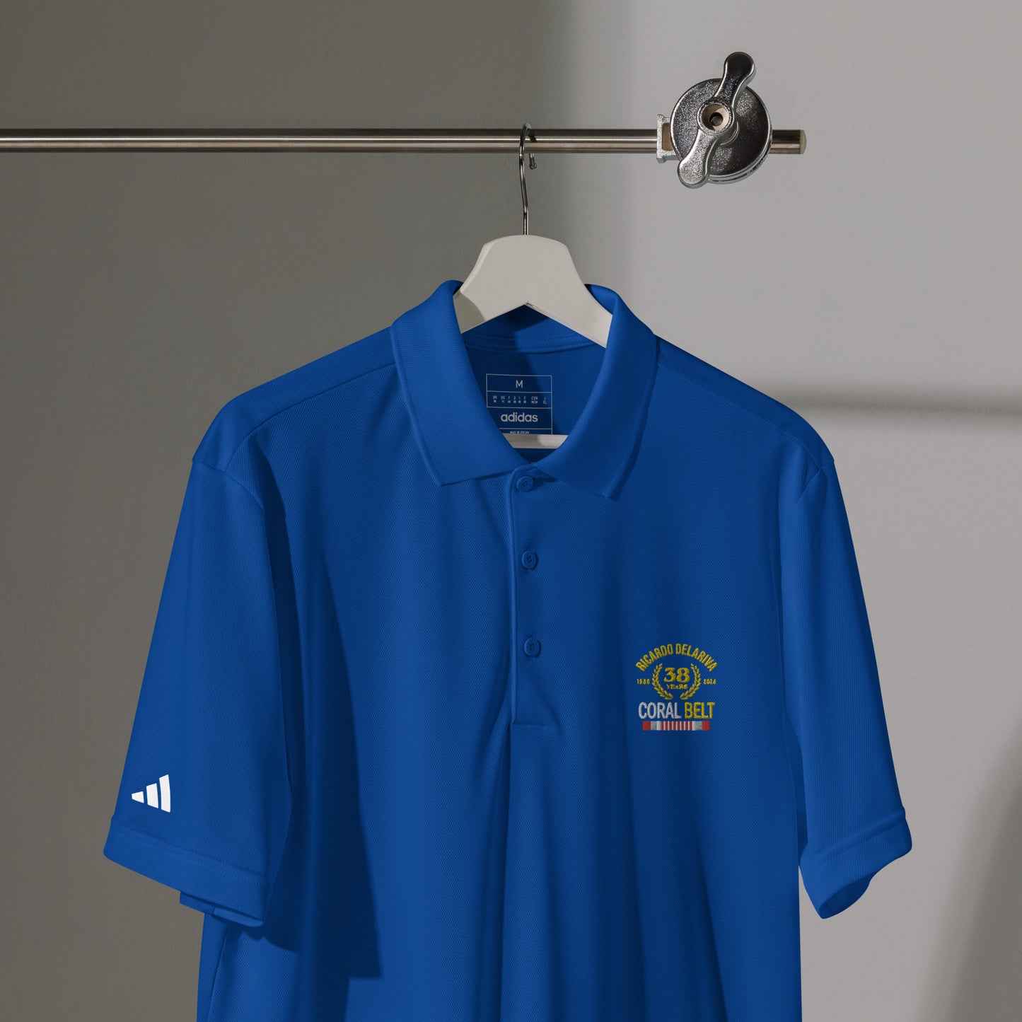 Adidas® Sport Polo Delariva's Coral Belt