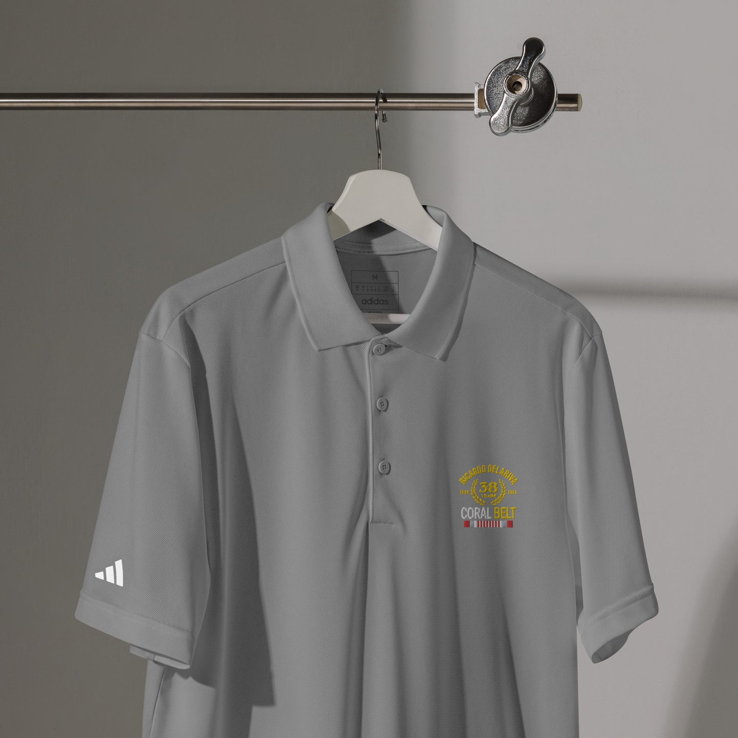 Adidas® Sport Polo Delariva's Coral Belt